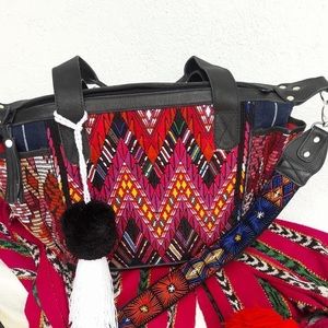Convertible huipil bag pom pom Guatemalan black